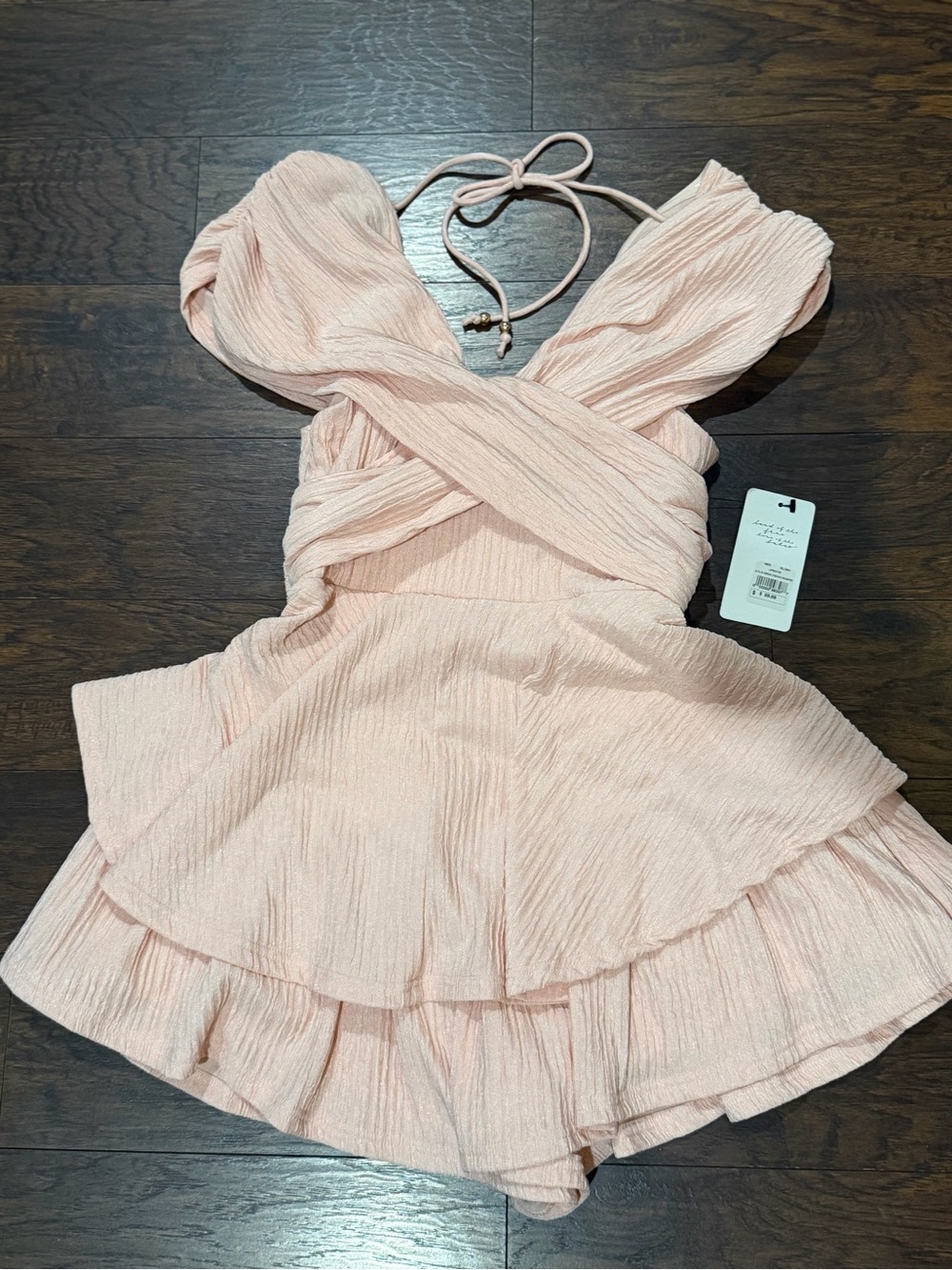 Hannah Plisse Criss Cross Ruffle Romper blush NWT